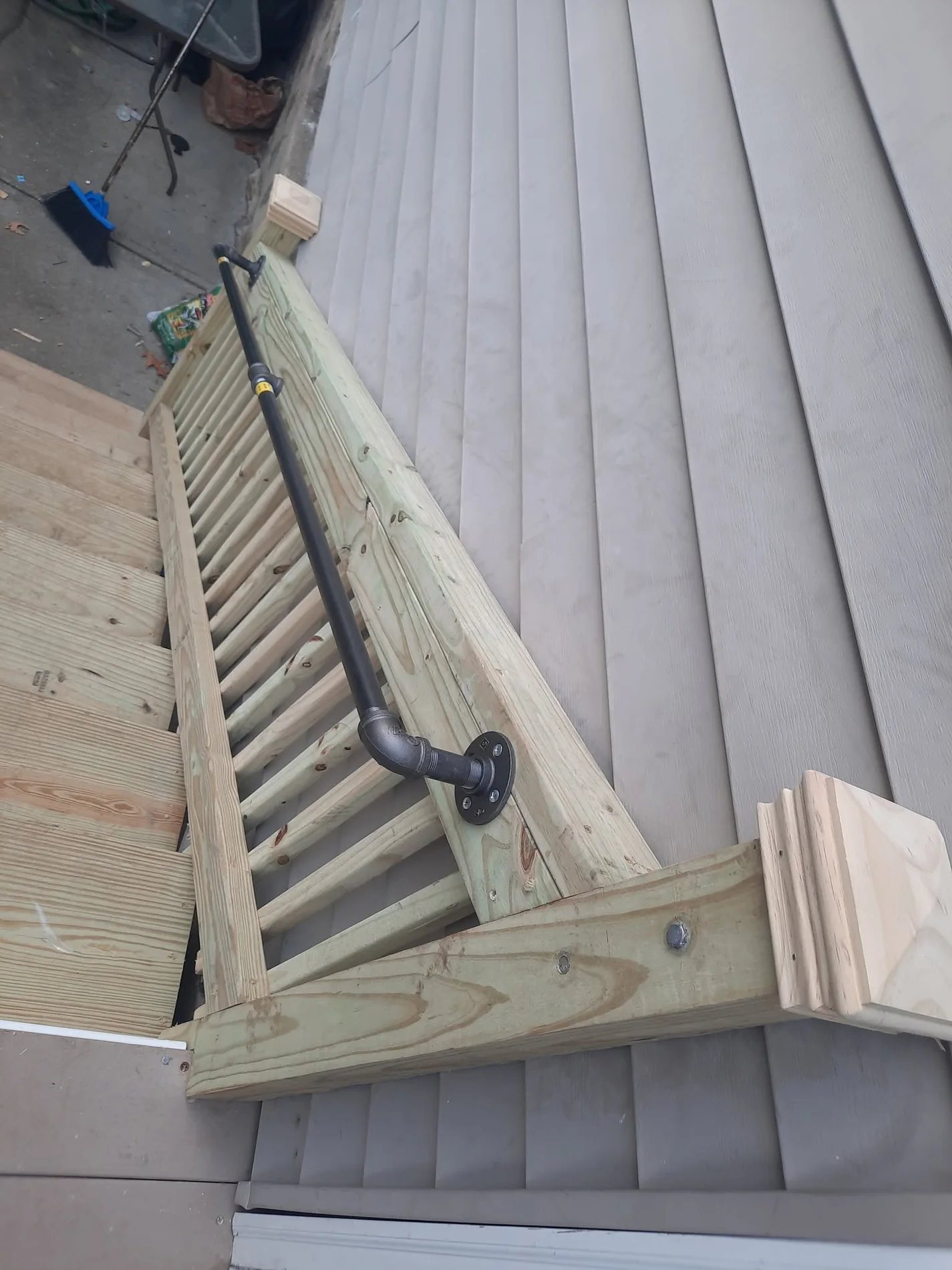 Exterior carpentry and railing improvement.