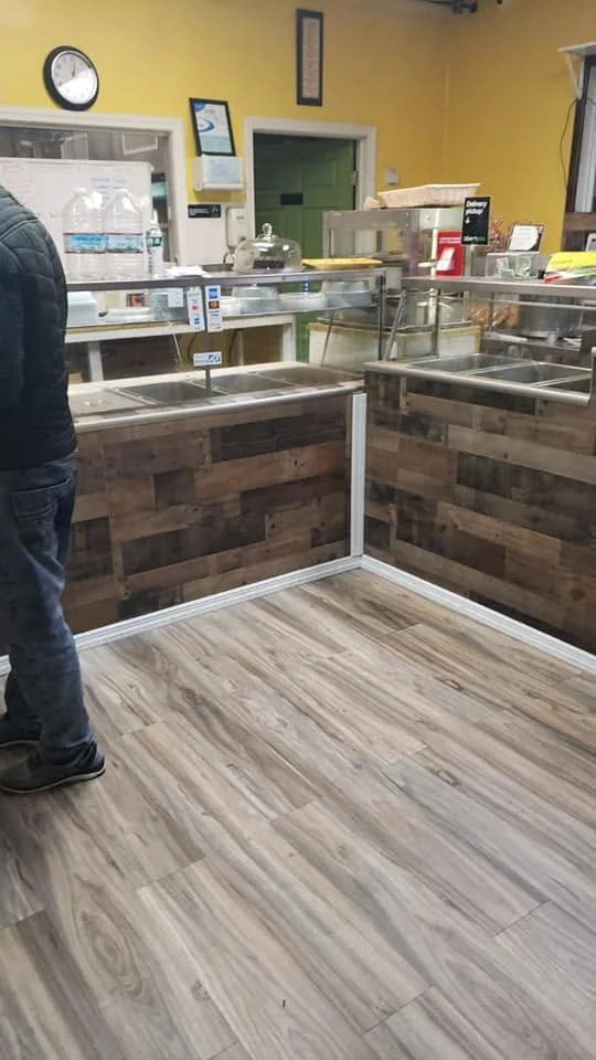 Wood-look flooring in a finished interior service space